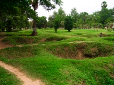 only the holes in the ground left after some of the massgraves